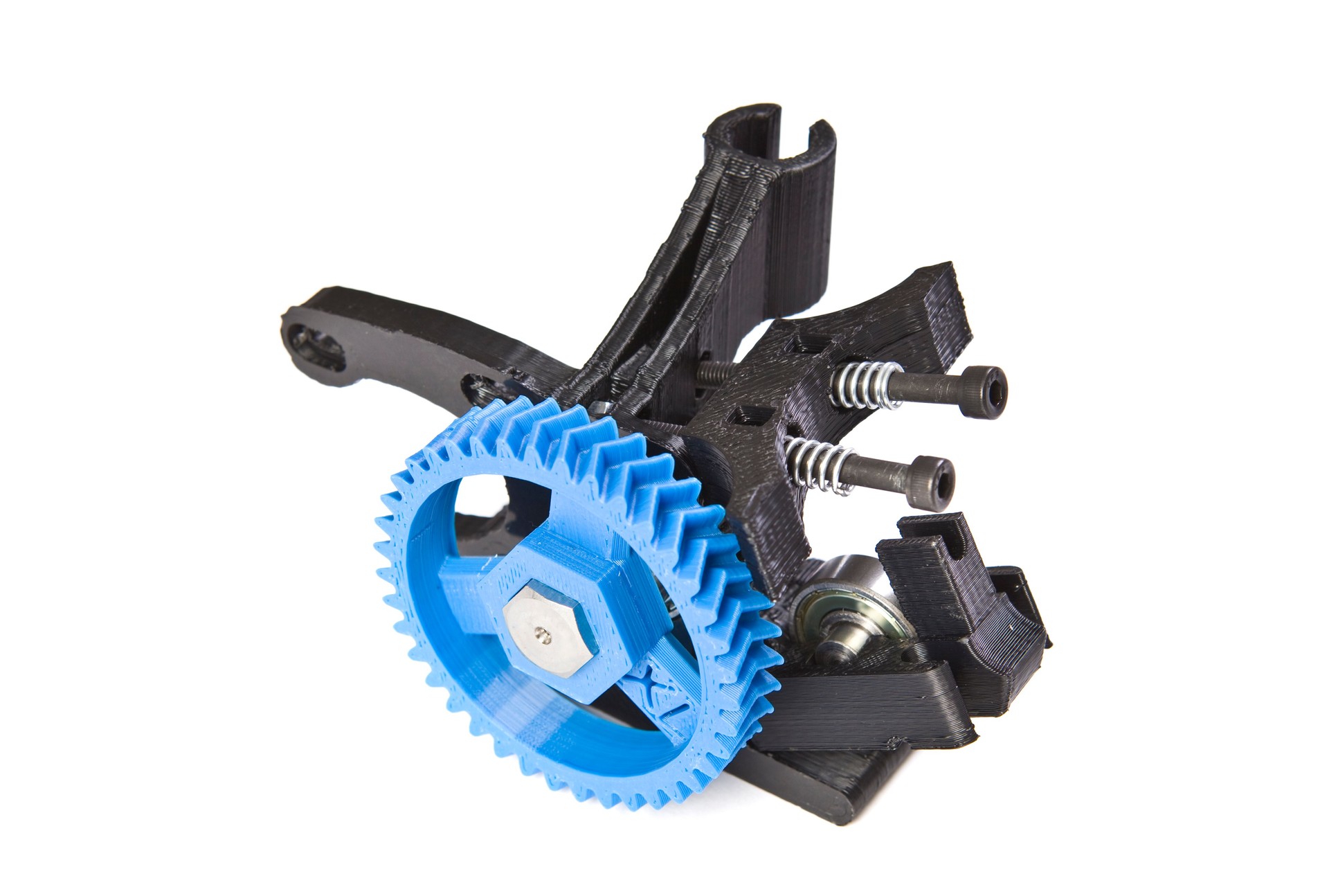 A close-up of a 3D printer herringbone gears